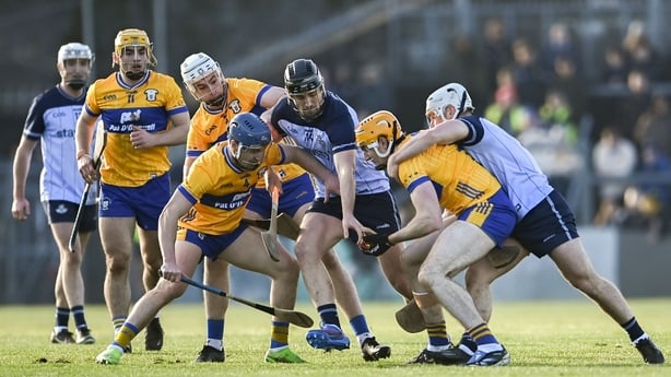 25 January 2026; David Fitzgerald of Clare is tackled by Andy Dunphy of Dublin during the Allianz Hurling League Division 1B match between Clare and Dublin at Zimmer Biomet Páirc Chíosóg in Ennis, Clare. Photo by Tom Beary/Sportsfile