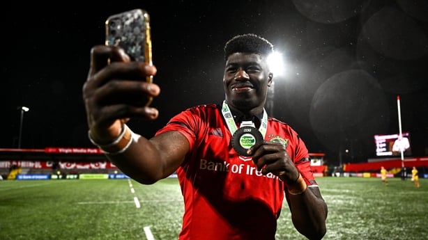 23 January 2026; Player of the match Sean Edogbo of Munster takes a selfie after the United Rugby Championship match between Munster and Dragons at Virgin Media Park in Cork. Photo by Ben McShane/Sportsfile