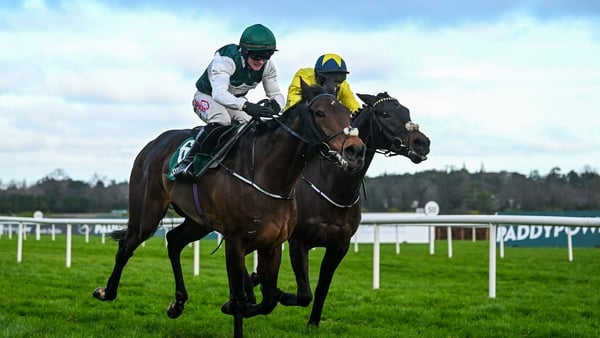 27 December 2025; Solness with Sam Ewing up, left, and Marine Nationale with Sean Flanagan up during the Paddy's Rewards Club Steeplechase on day two of the Leopardstown Christmas Festival at Leopardstown Racecourse in Dublin. Photo by Ramsey Cardy/Sports