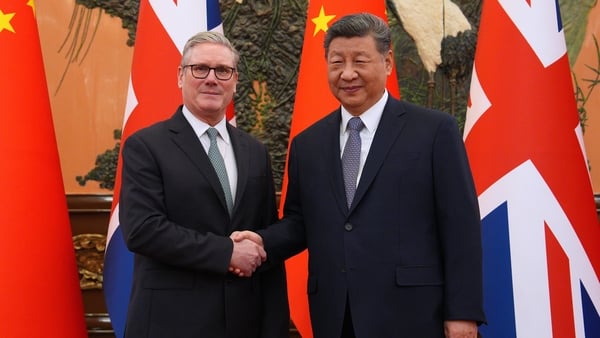 BEIJING, CHINA - JANUARY 29: UK Prime Minister Keir Starmer (L) shakes hands with Chinese President Xi Jinping (R) ahead of a bilateral meeting during his visit to China, on January 29, 2026 in Beijing, China. Keir Starmer undertakes a high-profile diplom