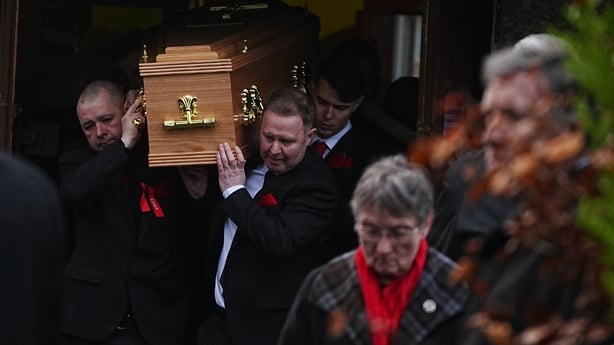 The coffin is carried to the hearse following the funeral mass of 16-year-old Grace Lynch