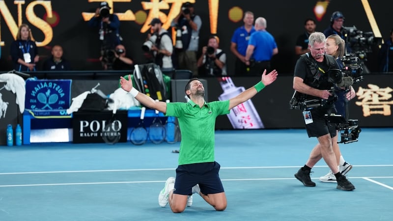 An elated Novak Djokovic celebrates a famous win on Rod Laver Arena