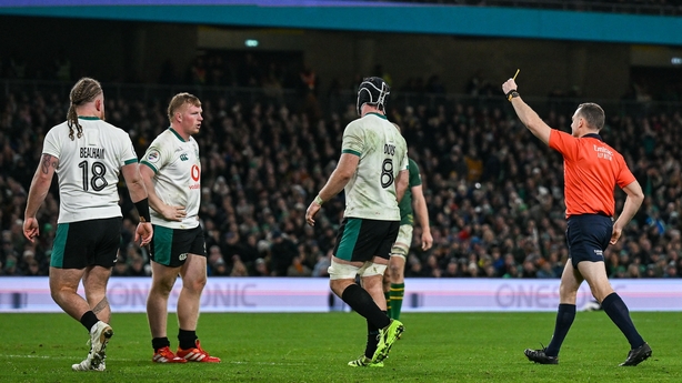 22 November 2025; Referee Matthew Carley shows a yellow card to Paddy McCarthy of Ireland second from left, during the Quilter Nations Series 2025 match between Ireland and South Africa at the Aviva Stadium in Dublin. Photo by Brendan Moran/Sportsfile