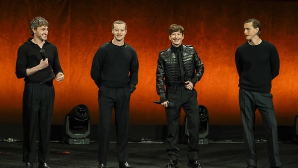 LAS VEGAS, NEVADA - MARCH 31: (L-R) Paul Mescal, Joseph Quinn, Barry Keoghan and Harris Dickinson are introduced onstage to promote four upcoming biopics about The Beatles at the Sony Pictures Entertainment presentation during CinemaCon, the official conv