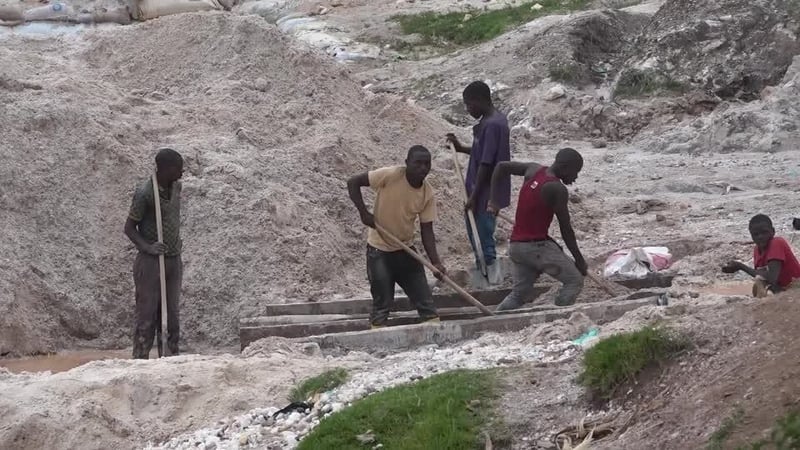 Workers at a mine collapse in DR Congo