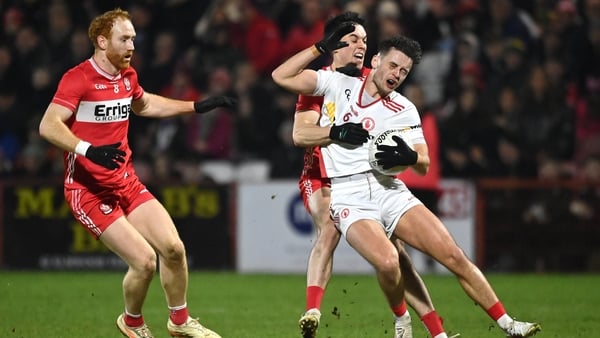 31 January 2026; Michael McKernan of Tyrone in action against Conor McCluskey of Derry during the Allianz Football League Division 2 match between Derry and Tyrone at Celtic Park in Derry. Photo by Oliver McVeigh/Sportsfile