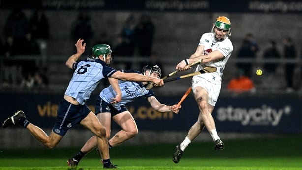 Caolán Smith of Kildare has a shot blocked by Chris Crummey and Donal Burke of Dublin during the Allianz Hurling League Division 1B match between Dublin and Kildare at Parnell Park in Dublin. Photo by Dáire Brennan/Sportsfile
