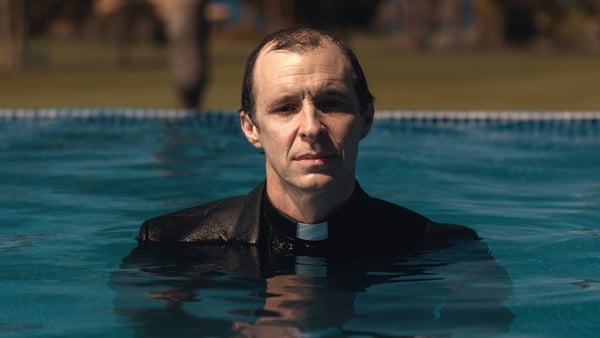Tom Vaughan-Lawlor in the pool as Father Vincent in These Sacred Vows