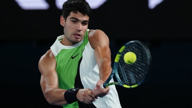 MELBOURNE, AUSTRALIA - FEBRUARY 1: Carlos Alcaraz of Spain returns a shot in the Men's Singles Final match against Novak Djokovic of Serbia during day 15 of the 2026 Australian Open at Melbourne Park on February 1, 2026 in Melbourne, Australia. (Photo by Fred Lee/Getty Images)
