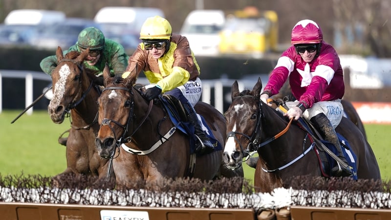 DUBLIN, IRELAND - FEBRUARY 01: JJ Slevin riding Talk The Talk (L, green) appear late on the scene to win The Tattersalls Ireland Novice Hurdle at Leopardstown Racecourse on February 01, 2026 in Dublin, Dublin. (Photo by Alan Crowhurst/Getty Images)