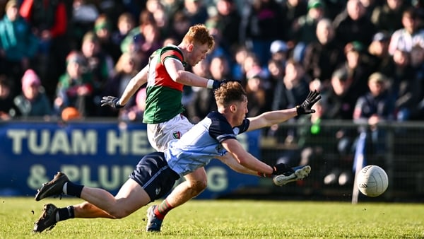 1 February 2026; Darragh Beirne of Mayo has a shot on goal despite the attention of Conor Tyrrell of Dublin during the Allianz Football League Division 1 match between Mayo and Dublin at the Hastings Insurance MacHale Park in Castlebar, Mayo. Photo by Ben