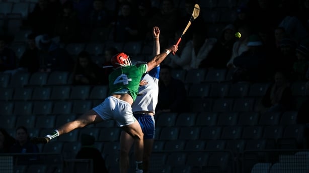 1 February 2026; Brian Lynch of Waterford is tackled by Barry Nash of Limerick during the Allianz Hurling League Division 1A match between Waterford and Limerick at Azzurri Walsh Park in Waterford. Photo by Ray McManus/Sportsfile