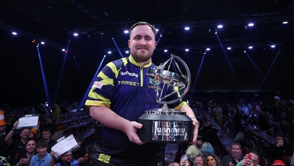MILTON KEYNES, ENGLAND - FEBRUARY 01: Winner Luke Littler with the trophy during the Day 4 of the 2026 Winmau World Masters Darts at Arena MK on January 30, 2026 in Milton Keynes, England. (Photo by Rob Newell - CameraSport via Getty Images)