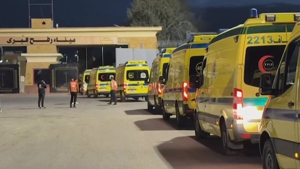 Ambulances and aid trucks in Egypt's Rafah move towards border crossing with Gaza
