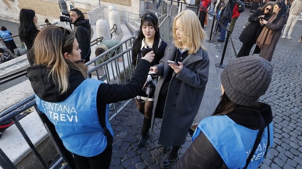 ROME, ITALY - FEBRUARY 02: Stewards check the entry tickets of tourists entering the Trevi Fountain in Rome, Italy, on February 02, 2026. Starting from February 02, Rome's municipality will introduce a Ã2 ticket to access the Trevi Fountain as a measure to tackle overtourism. (Photo by Riccardo De L
