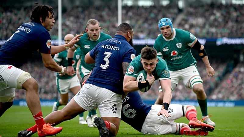 Dan Sheehan of Ireland is tackled by Uini Atonio of France during their Six Nations meeting in 2025