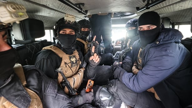 AL-HASAKAH, SYRIA - FEBRUARY 2: A convoy, belonging to the Syrian Ministry of Interior, consists of eight armored personnel carriers, numerous four-wheel-drive pickup trucks, ambulances and a mobile base station vehicle, and is moving along the eastern route in Al-Hasakah, Syria on February 2, 2026.