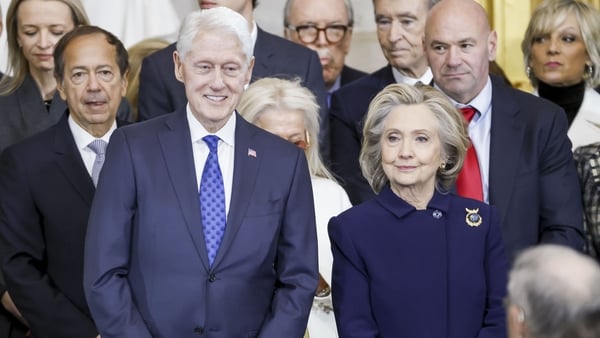 Former US President Bill Clinton (L) and former US Secretary of State Hillary Clinton (R) attend Donald Trump's inauguration.