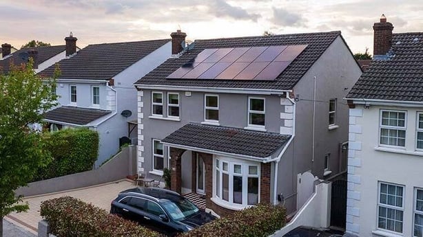 A picture of a house with solar panels by Electric Ireland
