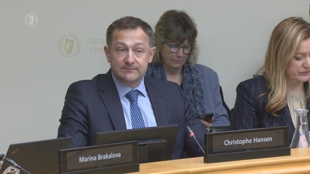 screengrab of a committee meeting with christophe hansen attending 