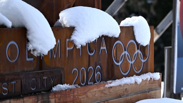 Signage is seen ahead of the Milano Cortina 2026 Winter Olympics in Cortina, Italy