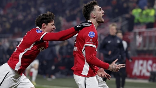 Troy Parrott, chased by team-mate Mateo Chavez, celebrates his extra-time goal against FC Twente