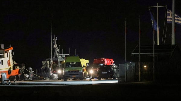 Emergency services on a quay at night