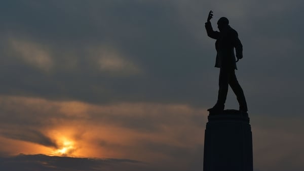BELFAST, NORTHERN IRELAND - SEPTEMBER 10: Sir Edward Carson's statue can be seen as the sun sets at Stormont on September 10, 2015 in Belfast, Northern Ireland. A political crisis has erupted in the province following the murder of former IRA member Kevin