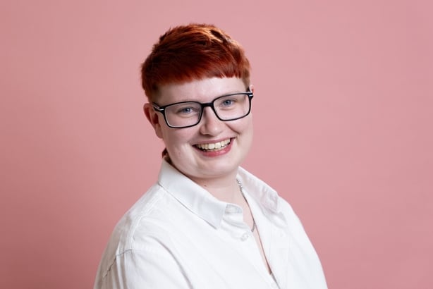 A woman smiling for a photo