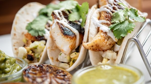 Fish Tacos: Fresh Haddock, Roasted Tomato Salsa, Corn Jicama Slaw, Guacamole, Serrano Honey Vinaigrette