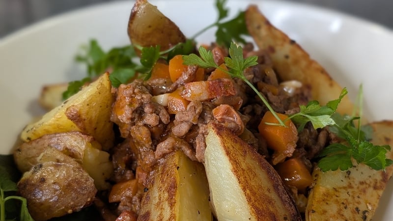 A dish with potatoes and chorizo