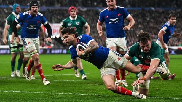5 February 2026; Matthieu Jalibert of France scores his side's second try despite the attempted tackle from Cian Prendergast of Ireland during the Guinness 6 Nations Rugby Championship match between France and Ireland at Stade de France in Paris, France. Photo by Ramsey Cardy/Sportsfile
