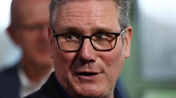 Britain's Prime Minister Keir Starmer talks with members of the audience after delivering a speech at Horntye Park Sports Complex, in St Leonards-on-Sea, south east England, on February 5, 2026. (Photo by Peter Nicholls / POOL / AFP)