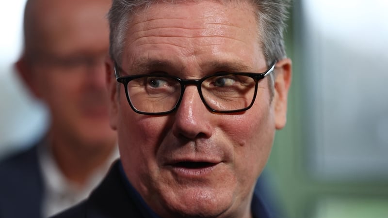 Britain's Prime Minister Keir Starmer talks with members of the audience after delivering a speech at Horntye Park Sports Complex, in St Leonards-on-Sea, south east England, on February 5, 2026. (Photo by Peter Nicholls / POOL / AFP)