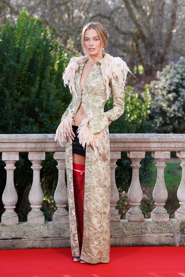 Margot Robbie during a photocall in St James's Place in London (Ian West/PA)