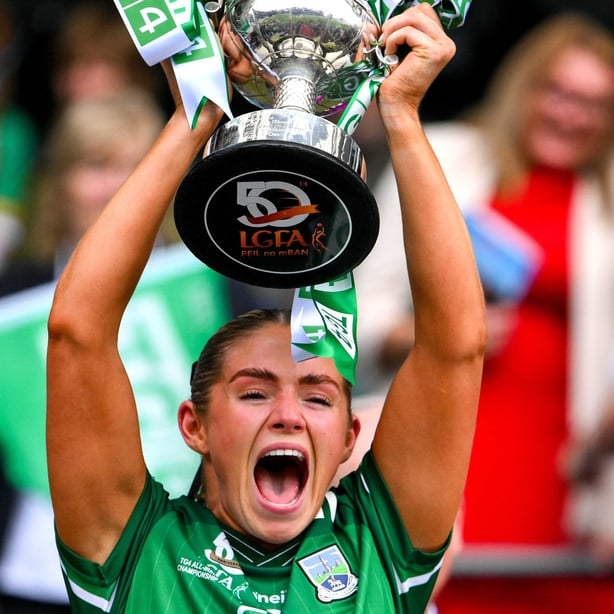 Brenda Bannon of Fermanagh lifts the West County Hotel cup after win over Louth in 2024 All-Ireland junior final