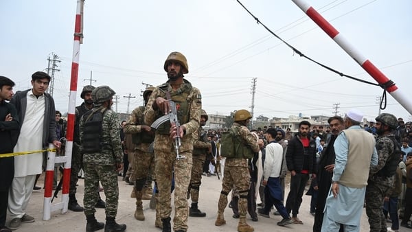 Security forces are seen at the site of a suicide attack at Islamabad mosque