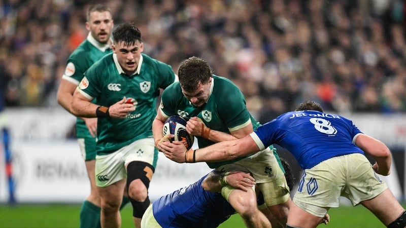 Cian Prendergast of Ireland is tackled by Julien Marchand, left, and Anthony Jelonch of France during the Guinness 6 Nations Rugby Championship match between France and Ireland at Stade de France in Paris, France. Photo by Brendan Moran/Sportsfile