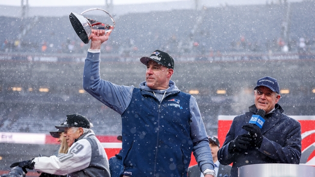 Mike Vrabel of the New England Patriots lifts the Lamar Hunt AFC Championship trophy after the AFC Championship game against the Denver Broncos at Empower Field At Mile High on January 25, 2026 in Denver, Colorado. (Photo by Lauren Leigh Bacho/Getty Images)