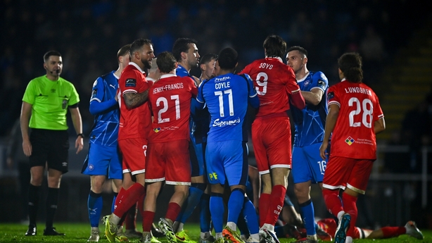 6 February 2026; Players from both sides tussle during the SSE Airtricity Men's Premier Division match between Waterford and Shelbourne at the Regional Sports Centre in Waterford. Photo by Tyler Miller/Sportsfile