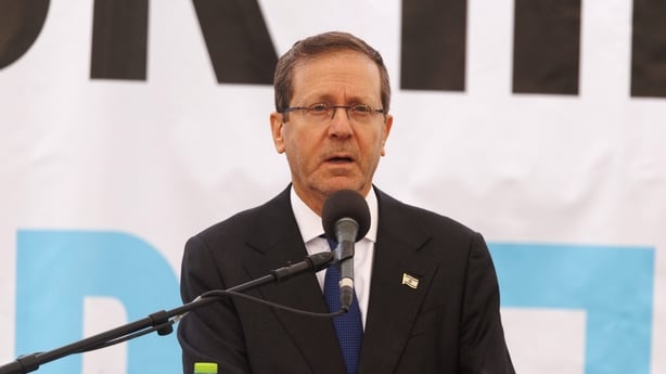 Isaac Herzog, Israel's president, speaks at the funeral of Israeli hostage Ran Gvili in Meitar, southern Israel, on Wednesday, Jan. 28, 2026. After searches by troops in a Gazan graveyard over the weekend, the Israeli army announced Monday that the body of Ran Gvili had been identified and brought b