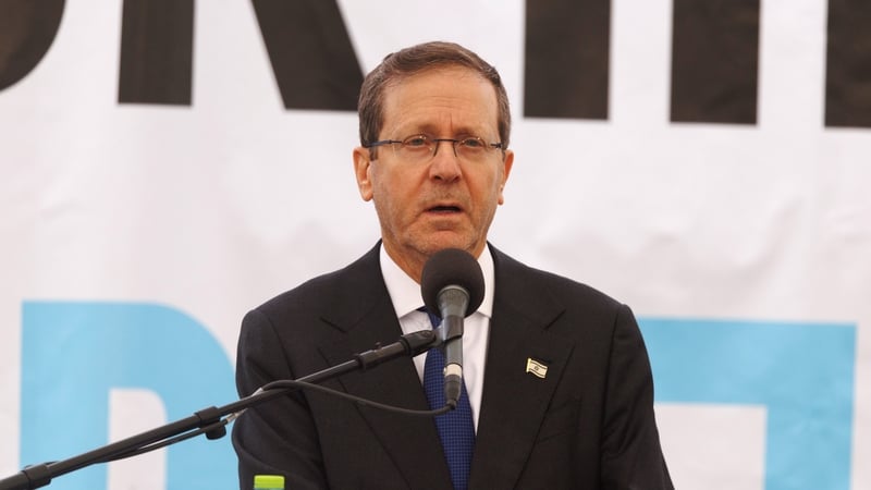 Isaac Herzog, Israel's president, speaks at the funeral of Israeli hostage Ran Gvili in Meitar, southern Israel, on Wednesday, Jan. 28, 2026. After searches by troops in a Gazan graveyard over the weekend, the Israeli army announced Monday that the body o