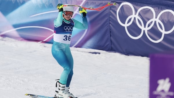 Ireland's Cormac Comerford crosses the finish line in the men's downhill alpine skiing event at 2026 Winter Olympics