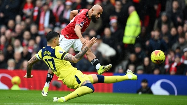 Bryan Mbeumo of Manchester United shoots past Cristian Romero of Tottenham Hotspur during the Premier League match between Manchester United and Tottenham Hotspur at Old Trafford on February 07, 2026 in Manchester, England. (Photo by Gareth Copley/Getty Images)
