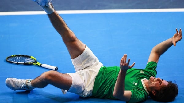 Peter Buldorini of Ireland picks up an injury during the singles match against Taym Alazmeh of Syria on day one of the Davis Cup World Cup Group II play-off match between Ireland and Syria at UL Arena in Limerick. Photo by Thomas Flinkow/Sportsfile