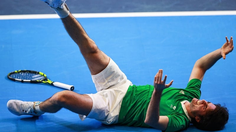 Peter Buldorini of Ireland picks up an injury during the singles match against Taym Alazmeh of Syria on day one of the Davis Cup World Cup Group II play-off match between Ireland and Syria at UL Arena in Limerick. Photo by Thomas Flinkow/Sportsfile