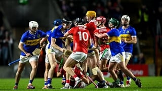 7 February 2026; Players of both sides jostle each other, just before half-time, during the Allianz Hurling League Division 1A match between Cork and Tipperary at SuperValu Páirc Ui Chaoimh in Cork. Photo by Ray McManus/Sportsfile