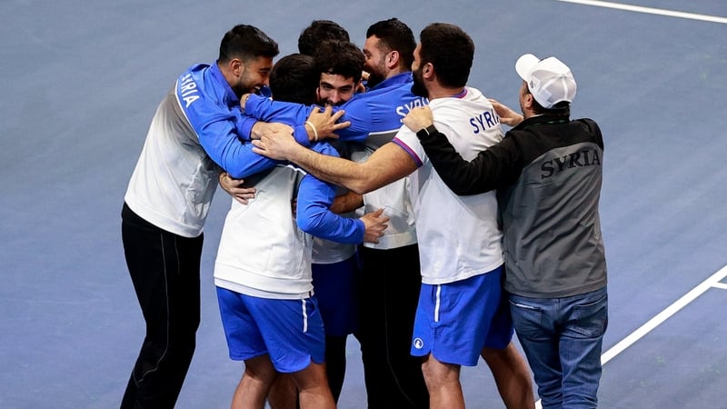 8 February 2026; Taym Alazmeh of Syria, third from left, celebrates with his team after winning the singles match against Michael Agwi of Ireland on day two of the Davis Cup World Cup Group II play-off match between Ireland and Syria at UL Arena in Limeri