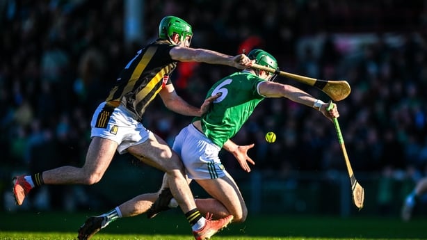 William O'Donoghue of Limerick is tackled by Eoin Cody of Kilkenny - 2026 Allianz Hurling League 