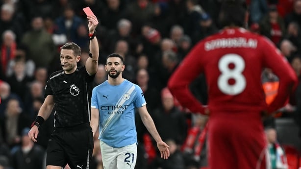 Dominik Szoboszlai is shown a red card at the end of the English Premier League football match between Liverpool and Manchester City at Anfield